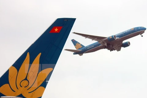 Máy bay của Vietnam Airlines cất cánh tại sân bay quốc tế Nội Bài. (Ảnh: Huy Hùng/TTXVN)