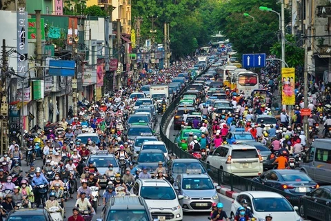 Mỗi người dân chỉ có một biển số xe nhằm giảm ùn tắc giao thông. (Ảnh: PV/Vietnam+)