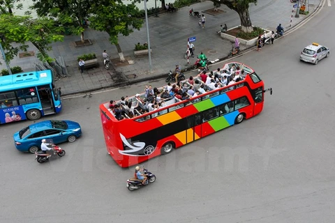 Chiếc xe buýt 2 tầng đầu tiên mang tên City Tour đã được chạy thử nghiệm trên đường phố Hà Nội vào ngày 30/6 vừa qua. (Ảnh: Minh Sơn/Vietnam+)
