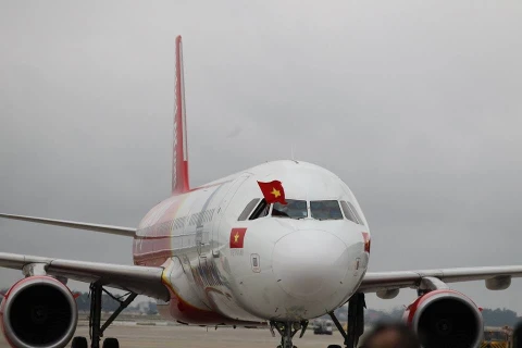 Chuyên cơ của hãng hàng không Vietjet chở đội tuyển U23 Việt Nam về nước. (Ảnh: Minh Sơn/Vietnam+)