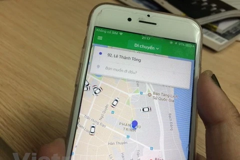 Ứng dụng gọi xe taxi công nghệ của Grab. (Nguồn: Vietnam+)