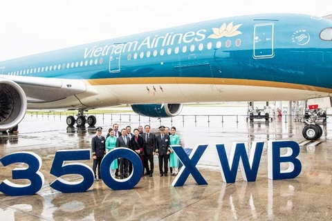 Lễ ra mắt máy bay Airbus A350-900 thứ 14 của Vietnam Airlines diễn ra dưới sự chứng kiến của Chủ tịch Quốc hội Việt Nam Nguyễn Thị Kim Ngân và các đại biểu trong Đoàn cấp cao Quốc hội Việt Nam. (Ảnh: Anh Tuấn)