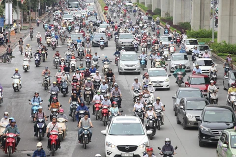 Từ năm 1990-2018, xe máy ở Việt Nam tăng khoảng 48 lần gây áp lực lên hạ tầng giao thông. (Ảnh: Việt Hùng/Vietnam+)