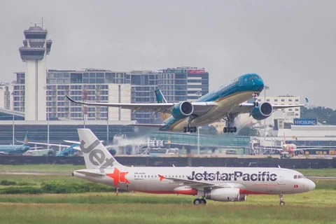 Hành khách sẽ có thêm nhiều lựa chọn về giờ bay thông qua việc liên danh Vietnam Airlines-Jetstar Pacific. (Ảnh: Đức Anh/Vietnam+)