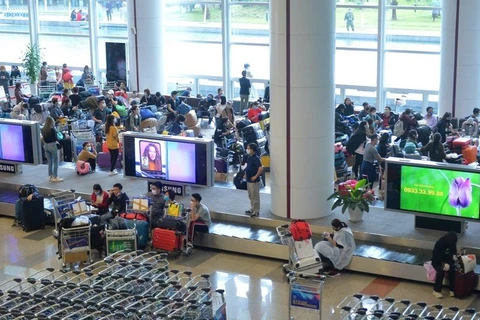 Hành khách tại một sân bay. (Ảnh: Hoàng Anh/Vietnam+)