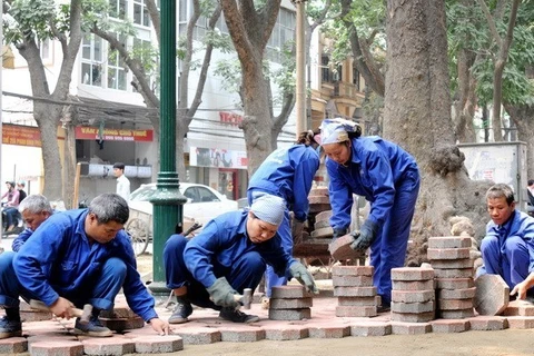 Hà Nội tạm dừng thi công đào đường dịp Đại hội Đảng và Tết. (Nguồn ảnh: TTXVN)