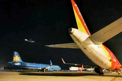 Sân bay Tân Sơn Nhất sẽ được tăng cường khai thác chuyến bay đêm trong dịp Tết Nguyên đán. (Ảnh: CTV/Vietnam+)