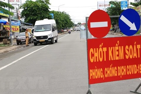 Chốt kiểm soát phòng, chống dịch COVID-19 số 1 tại phường Trường An, thành phố Vĩnh Long (tỉnh Vĩnh Long) chính thức hoạt động từ ngày 9/6/2021. (Ảnh: Lê Thúy Hằng/TTXVN)