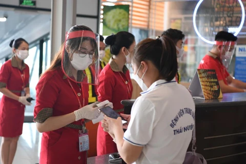 Hãng hàng không Vietjet đã vận chuyển hàng nghìn y bác sỹ vào Thành phố Hồ Chí Minh chống dịch COVID-19. (Ảnh: CTV/Vietnam)