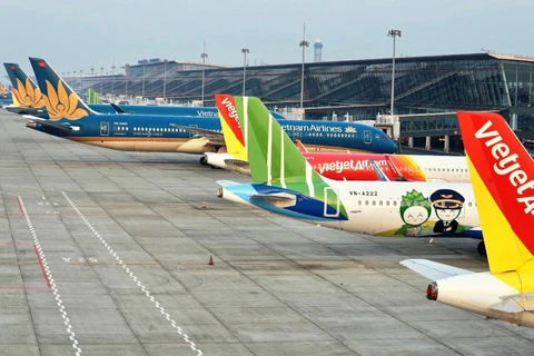 Máy bay của các hãng hàng không tạm dừng hoạt động bay tại sân bay Nội Bài. (Ảnh: CTV/Vietnam+)