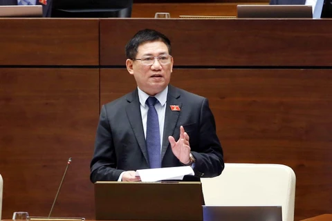 Bộ trưởng Bộ Tài chính Hồ Đức Phớc phát biểu giải trình, làm rõ một số vấn đề đại biểu Quốc hội nêu. (Ảnh: Doãn Tấn/TTXVN)