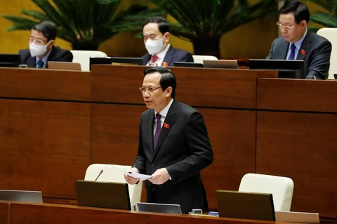 Bộ trưởng Bộ Lao động, Thương binh và Xã hội Đào Ngọc Dung trả lời chất vấn của đại biểu Quốc hội. (Ảnh: Phương Hoa/TTXVN)
