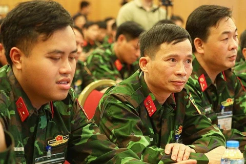 Các kiểm định viên quân sự chi viện cho Hà Nội và Thành phố Hồ Chí Minh. (Ảnh: CTV/Vietnam+)