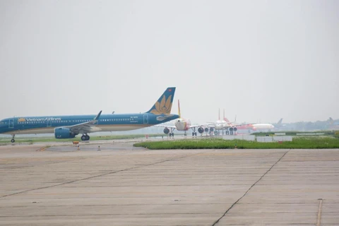 Máy bay của hãng hàng không đang lăn ra đường cất, hạ cánh. (Ảnh: Việt Hùng/Vietnam+)