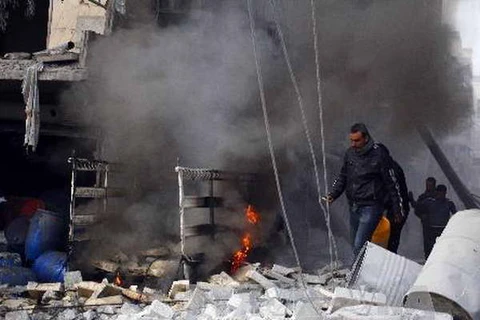 Cảnh đổ nát ở Aleppo do xung đột giữa quân Chính phủ và quân nổi dậy ngày 28/11. (Nguồn: AFP/TTXVN)