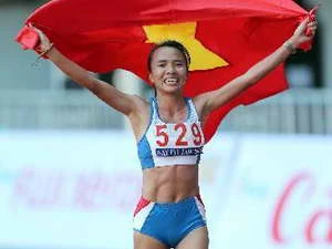 VĐV Phạm Thị Bình xuất sắc đoạt Huy chương Vàng nội dung Marathon nữ 42km. (Ảnh: Quang Nhựt/TTXVN) 
