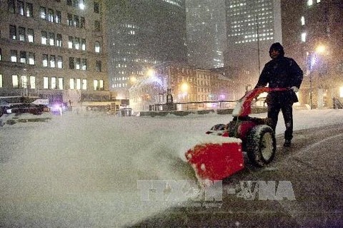 Tuyết ngập đường phố tại hạ Manhattan ngày 2/1. (Nguồn: AFP/TTXVN)