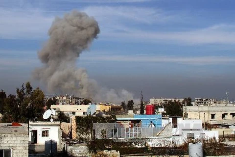 Khói bốc lên sau xung đột tại Daraya, phía tây nam thủ đô Damascus ngày 7/1/2014. (Nguồn: AFP/TTXVN)