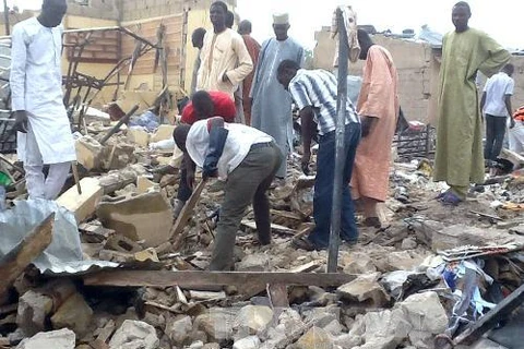 Hiện trường một vụ đánh bom tại Nigeria. (Nguồn: AFP/TTXVN)