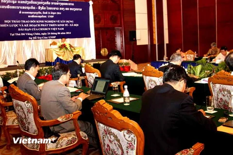 Việt-Lào trao đổi kinh nghiệm phát triển kinh tế xã hội dài hạn