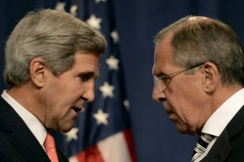 Ngoại trưởng Nga Sergei Lavrov và người đồng cấp Mỹ John Kerry. (Nguồn: AFP)