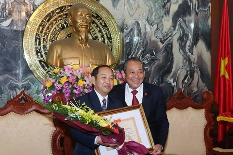 Việt Nam chia sẻ kinh nghiệm trong lĩnh vực tòa án với Lào