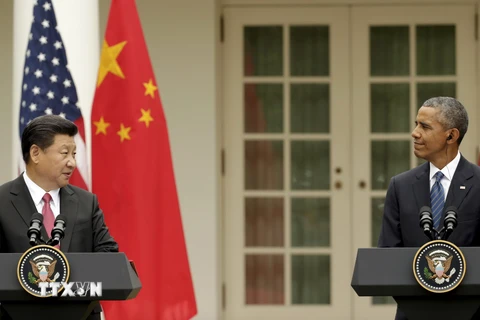 Tổng thống Mỹ Barack Obama (phải) và Chủ tịch Trung Quốc Tập Cận Bình (trái) tại cuộc họp báo chung ở Nhà Trắng ngày 25/9. (Nguồn: Reuters/TTXVN)