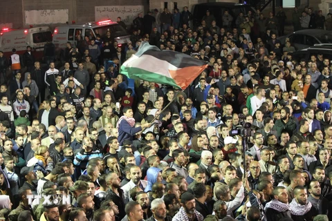 Người Palestine biểu tình phản đối Israel ở thị trấn Hebron ngày 30/10. AFP/ TTXVN