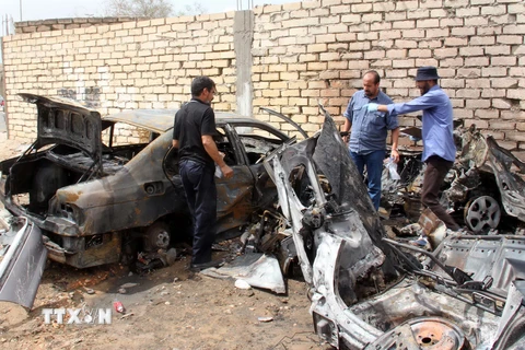 Hiện trường một vụ đánh bom tại Libya. (Nguồn: THX/TTXVN)