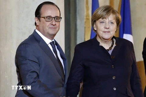 Tổng thống Pháp Francois Hollande (trái) và Thủ tướng Đức Angela Merkel tại cuộc gặp. (Nguồn: AFP/TTXVN)