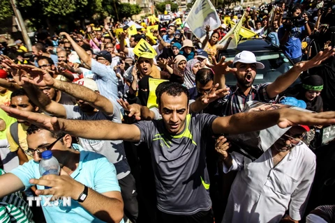 Biểu tình bày tỏ sự ủng hộ Tổng thống bị phế truất Mohammed Morsi tại Ai Cập. (Nguồn: THX/TTXVN)