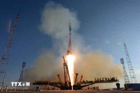 Tên lửa đẩy mang theo tàu vũ trụ Soyuz TMA-11M của Nga rời bệ phóng ở trung tâm vũ trụ Baikonur , Kazakhsta tháng 11/2013. (Nguồn: AFP/TTXVN)