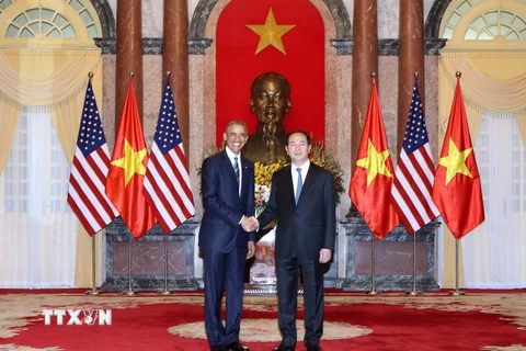 Chủ tịch nước Trần Đại Quang và Tổng thống Hoa Kỳ Barack Obama. (Ảnh: Nhan Sáng/TTXVN)