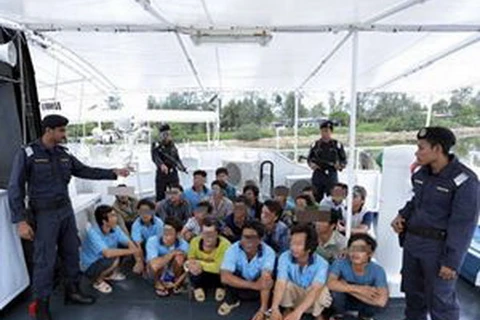 Các ngư dân Việt Nam bị bắt giữ. (Nguồn: Bernama.com)