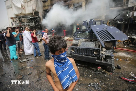 Hiện trường một vụ đánh bom ở Baghdad. (Nguồn: AFP/TTXVN)