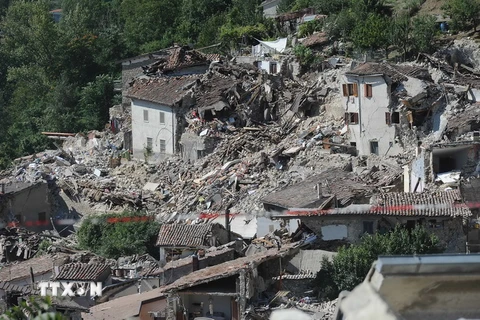 Những ngôi nhà bị tàn phá trong động đất tại Pescara del Tronto ngày 25/8. (Nguồn: AFP/TTXVN)
