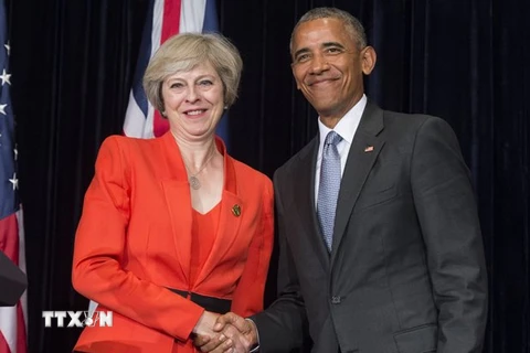 Tổng thống Barack Obama (phải) và Thủ tướng Anh Theresa May (trái) tại cuộc gặp ở Hàng Châu. (Nguồn: AFP/TTXVN)