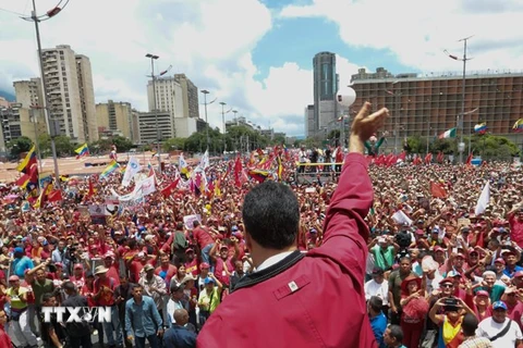 Người dân Venezuela tuần hành ủng hộ Chính phủ tại Caracas ngày 1/9. (Nguồn: EPA/TTXVN)