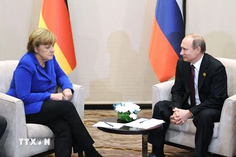 Tổng thống Nga Vladimir Putin và Thủ tướng Đức Angela Merkel bên lề Hội nghị G20 tại Thổ Nhĩ Kỳ năm 2015. (Nguồn: AFP/TTXVVN)