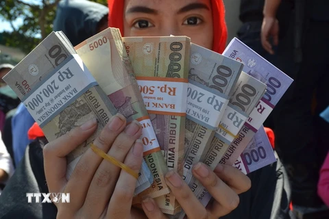 Đồng rupiah của Indonesia. (Nguồn: AFP/TTXVN)