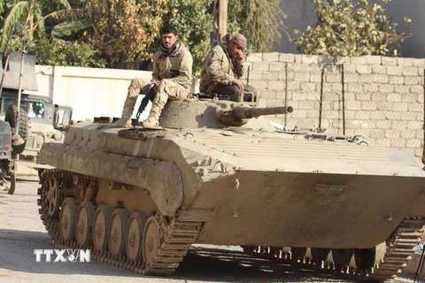 Quân đội Chính phủ Iraq trong cuộc chiến chống Is tại Mosul, Iraq ngày 10/12. (Nguồn: THX/TTXVN)