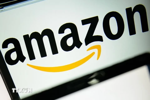 Biểu tượng của tập đoàn Amazon. (Nguồn: AFP/TTXVN)