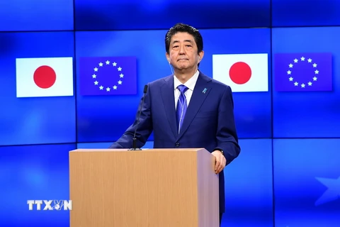 Thủ tướng Nhật Bản Shinzo Abe tại một sự kiện ở Brussels, Bỉ ngày 21/3. AFP/TTXVN