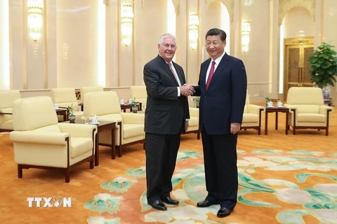 Chủ tịch Trung Quốc Tập Cận Bình (phải) và Ngoại trưởng Mỹ Rex Tillerson. (Nguồn: AFP/TTXVN)