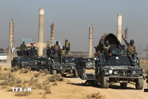 Chính phủ Iraq tiến vào thành phố Kirkuk sau khi giành lại quyền kiểm soát thành phố này từ lực lượng người Kurd ngày 16/10. (Nguồn: AFP/TTXVN)