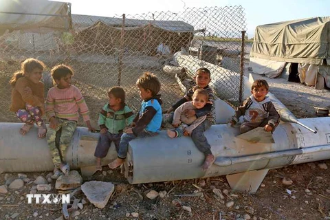Trẻ em tại một trại tị nạn ở Đông Ghouta, Syria ngày 25/10. (Nguồn: AFP/TTXVN)