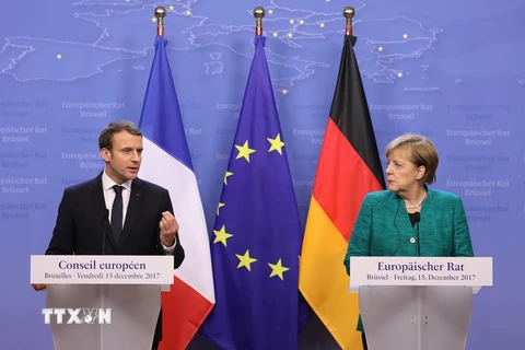 Tổng thống Pháp Emmanuel Macron (trái) và Thủ tướng Đức Angela Merkel. (Nguồn: AFP/TTXVN) 