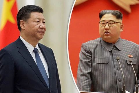 Chủ tịch Trung Quốc Tập Cận Bình (trái) và nhà lãnh đạo Triều Tiên Kim Jong-un. (Nguồn: Getty)