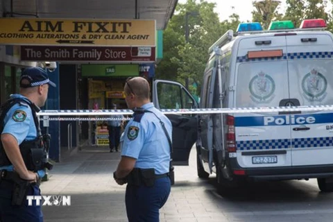 Cảnh sát điều tra tại hiện trường vụ nổ súng. (Nguồn: The Sydney Morning Herald/TTXVN)