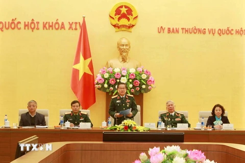 Đại tướng Đỗ Bá Tỵ, Phó Chủ tịch Quốc hội tiếp Đoàn đại biểu Cựu chiến binh Vị Xuyên, tỉnh Hà Giang. (Ảnh: An Đăng/TTXVN)